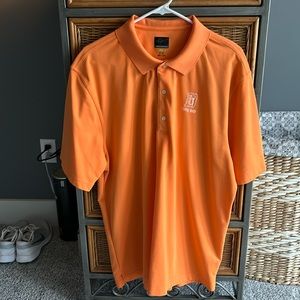 Men’s XL orange golf shirt.